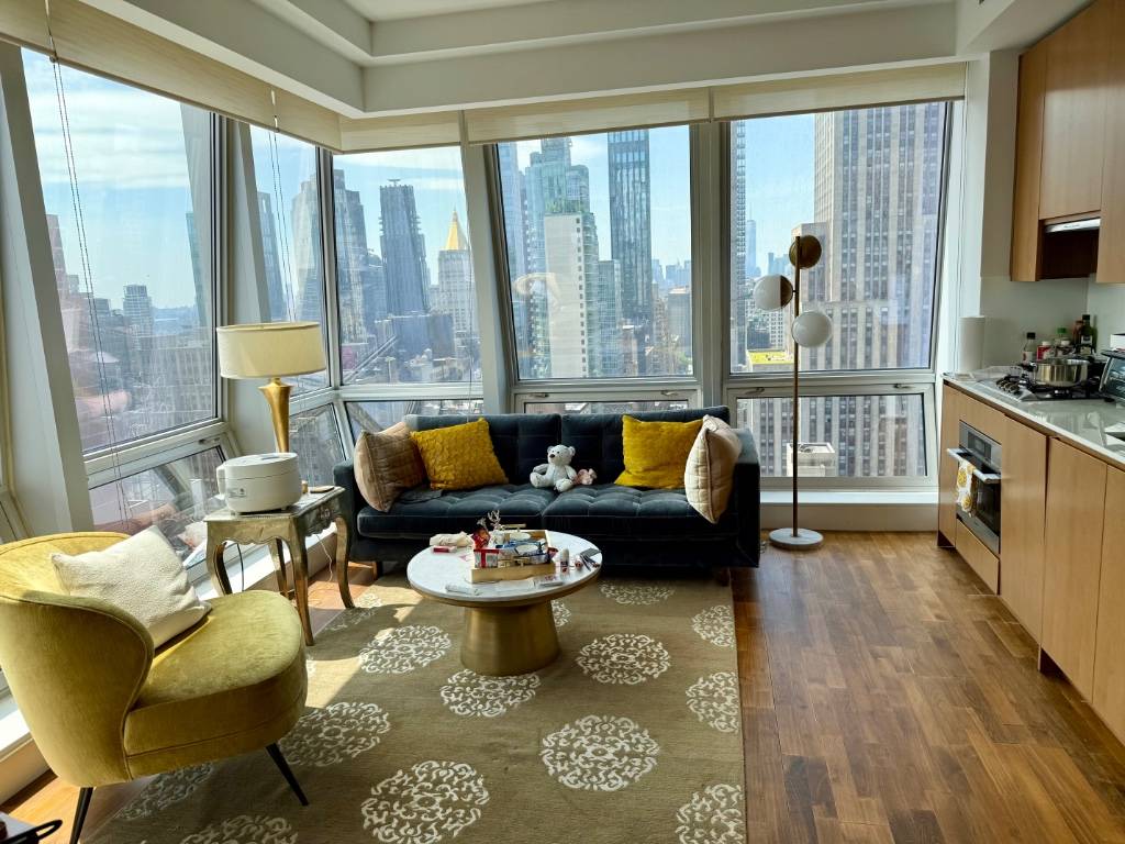 Welcome to Residence 32A at The Residences at 400 Fifth Avenue a rarely available, high floor corner unit offering unmatched city views and refined design.