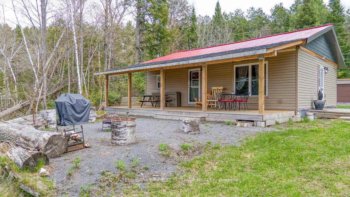 Enjoy year round lakeside living at this well maintained two bedroom home on quiet and picturesque Robbs Lake.