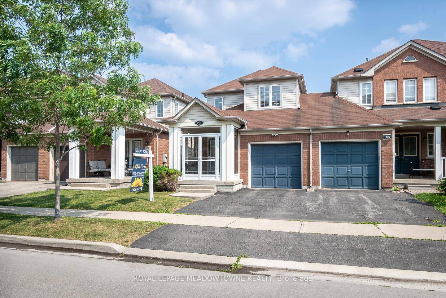 Welcome to this beautifully updated end unit townhome in Milton's desirable Dempsey neighbourhood where the only shared wall is the garage, offering rare privacy and comfort.