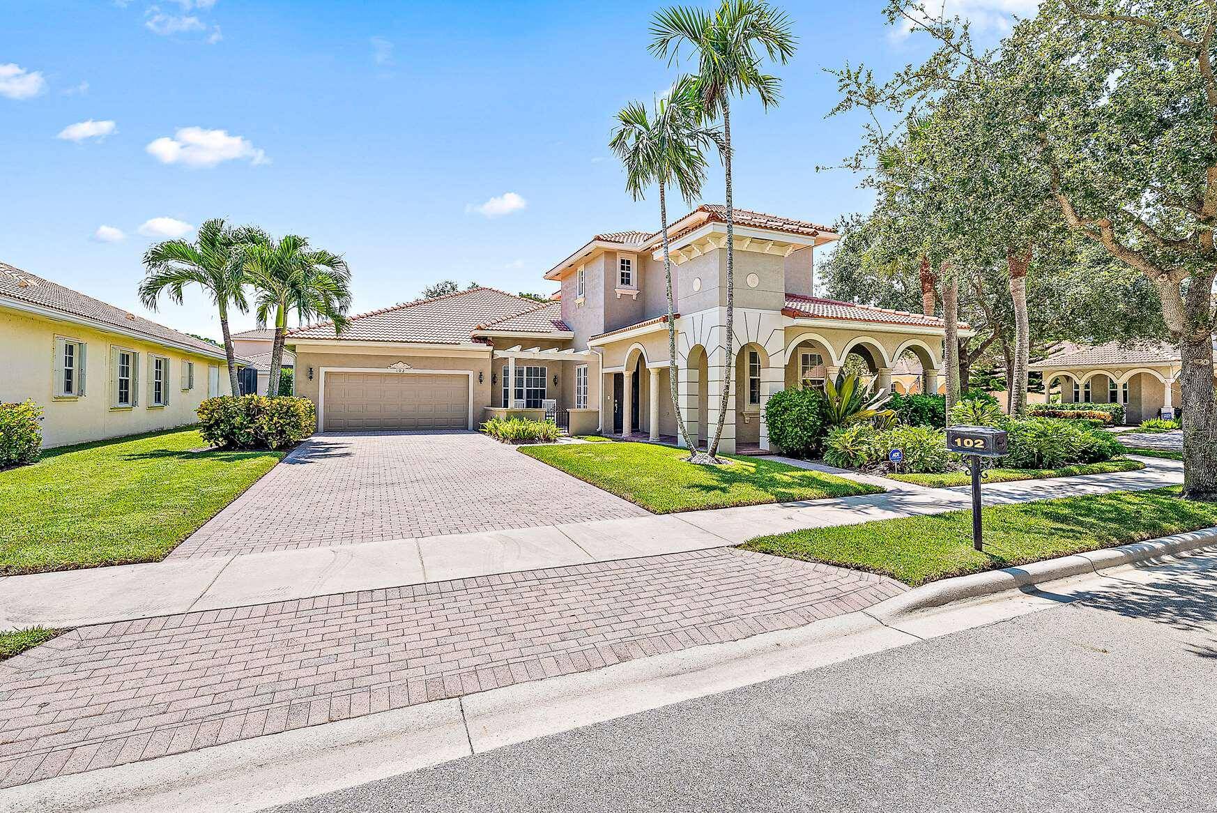 BEAUTIFULLY UPDATED AND FURNISHED TWO STORY HOME WITH THE MASTER SUITE ON THE GROUND FLOOR.