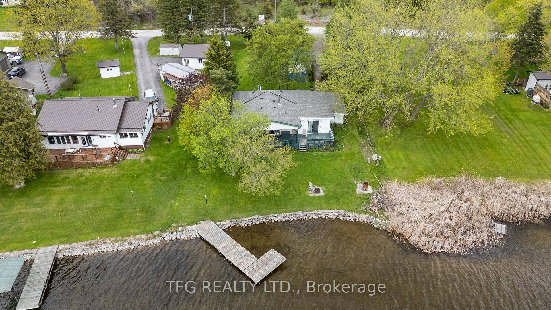 Waterfront oasis with western exposure on the beautiful Trent River with 70' of water frontage with dock and walk in shoreline.