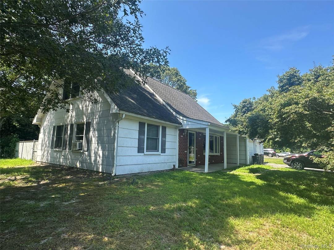 Welcome to this classic Cape style home situated on a spacious 0.