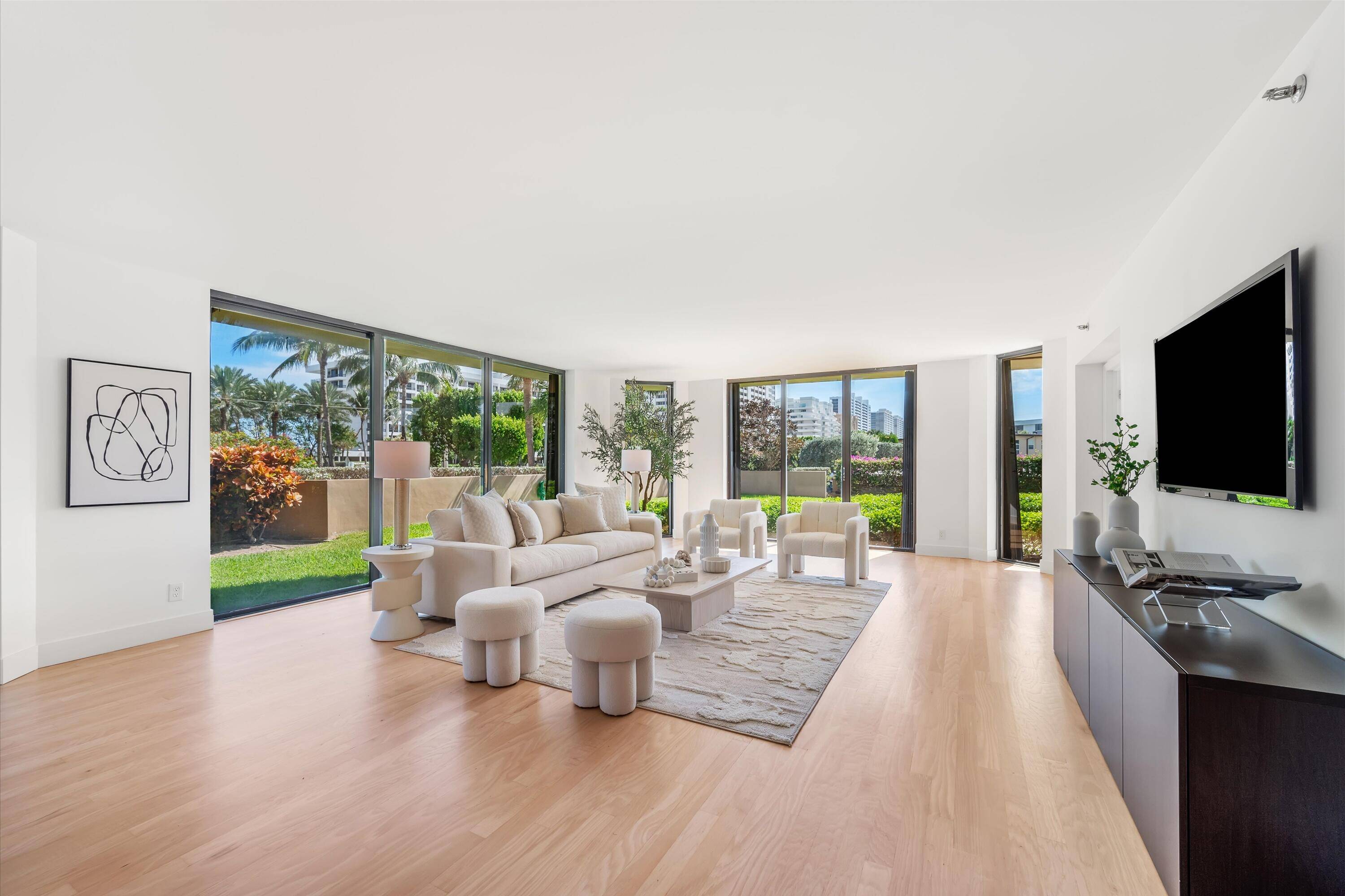 Beautifully updated three bedroom lanai lives like a sprawling single family home with private wraparound patio and gardens.