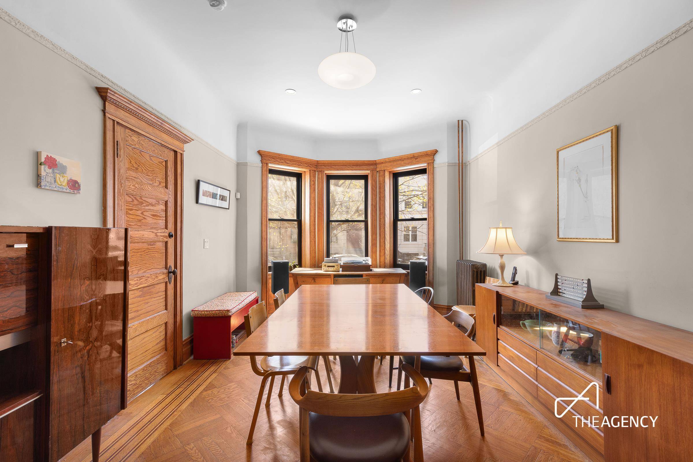 Nestled within the charming streets of Crown Heights, this impeccably restored barrel front brick two family townhouse exudes timeless elegance and modern comfort.