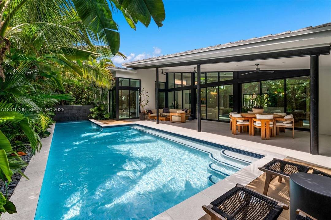 Welcome to a private, gated Mid Century Modern residence completed in 2021, designed with a focus on both style and comfort.