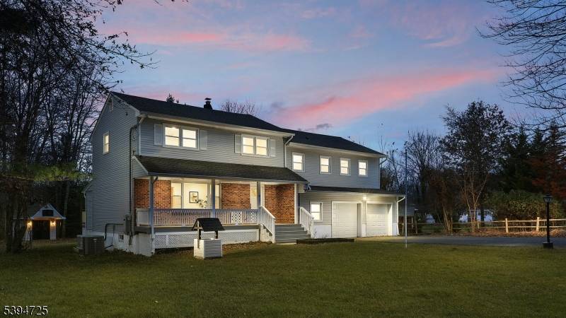 Beautifully updated, this five bedroom, three and a half bath residence offers a refined blend of contemporary updates and inviting comfort throughout.