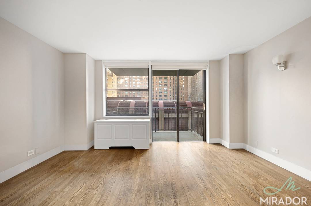 Spacious one bedroom with a private balcony at Tower 67.