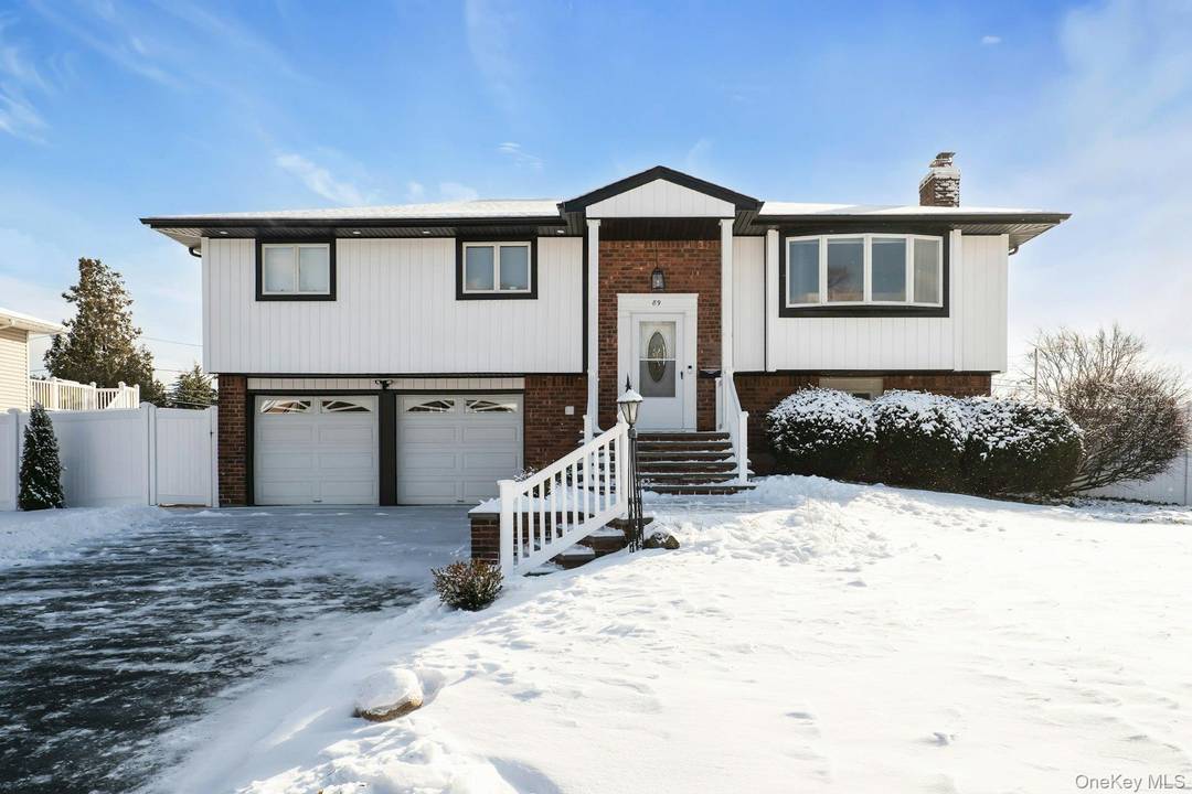 Renovated 4 bedroom, 3 full bath hi ranch rental situated on a.