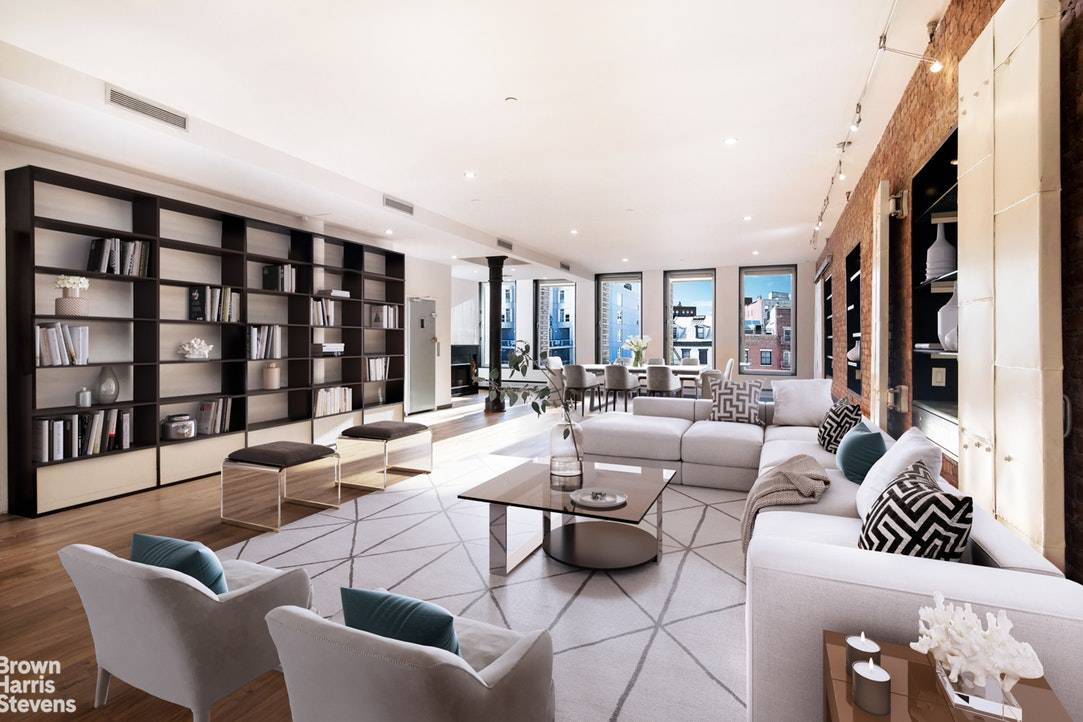 Beautifully Renovated Private Floor Loft with Three Bedrooms and Two and a Half Bathrooms Located in one of the Most Desirable Areas of Manhattan at 50 Bond Street.