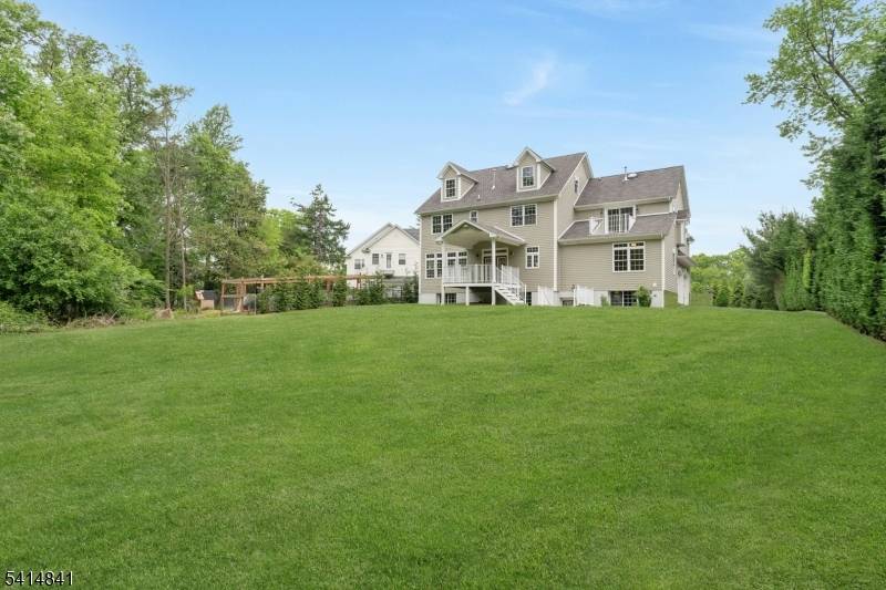 Experience unparalleled luxury in this remarkably crafted 6 bedroom 5 bath colonial home.