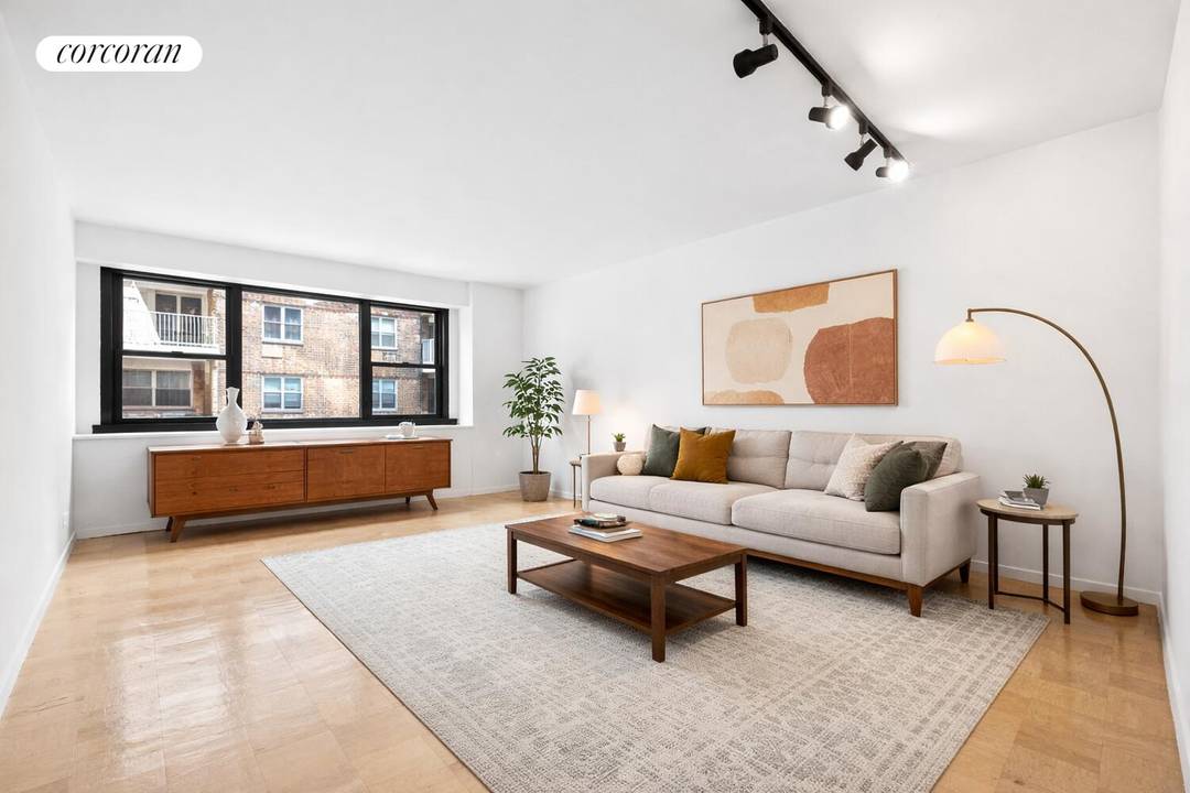 Welcome to this spacious one bedroom residence in a full service Upper East Side cooperative, offering exceptional quiet and comfort.
