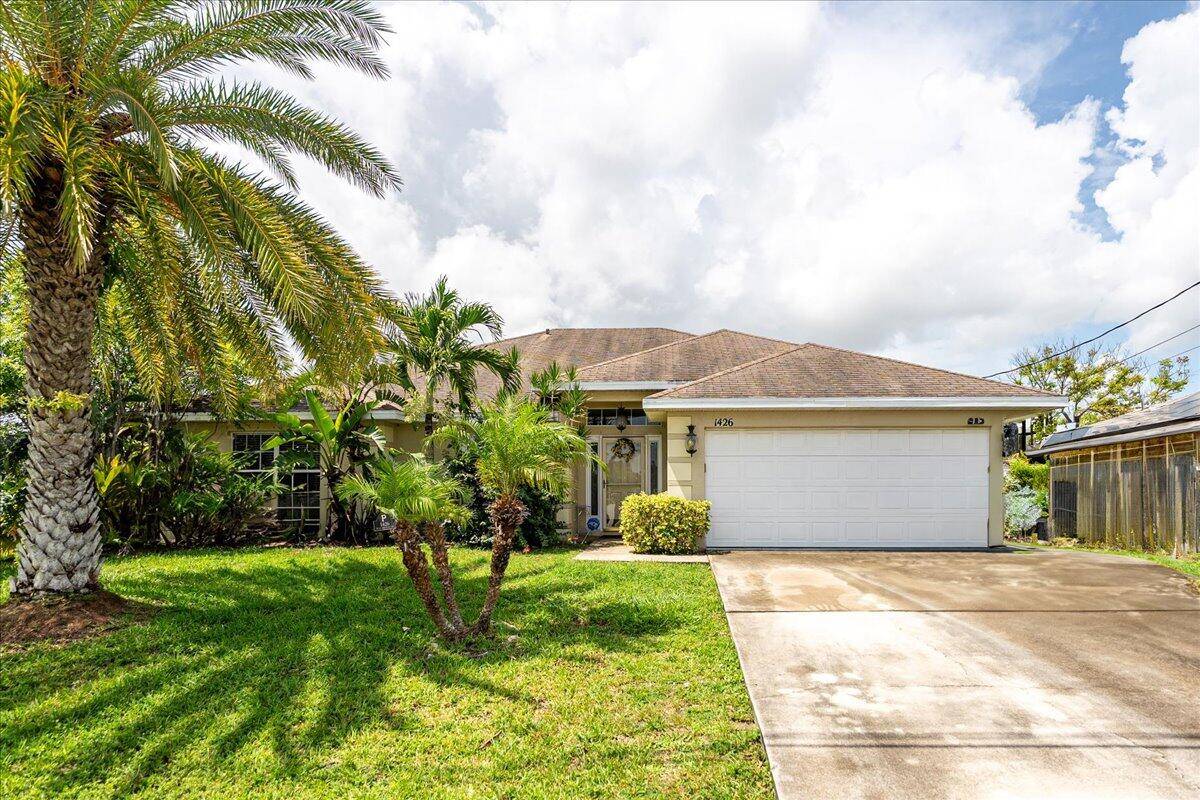 Beautiful, well maintained four bedroom, two bath, two car garage, CBS home.