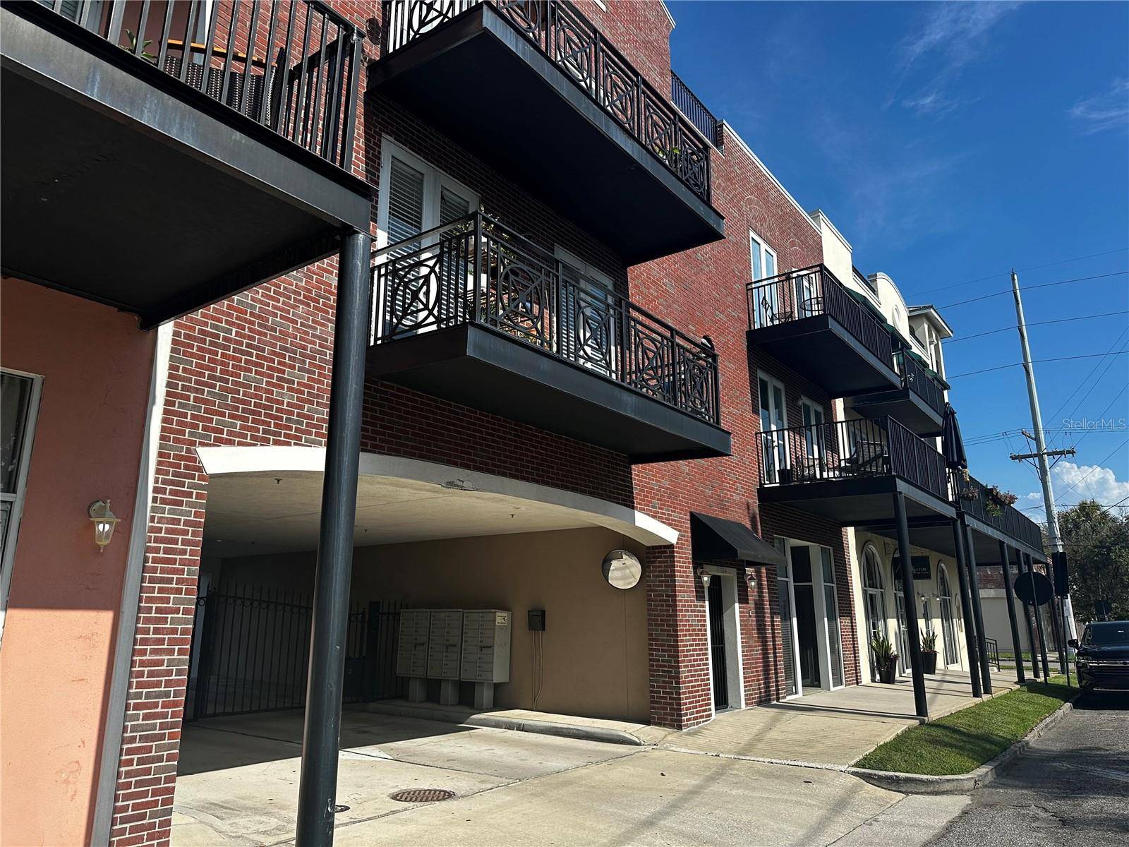 his 1st floor unit is within a beautiful condominium in Ybor City Historic District.