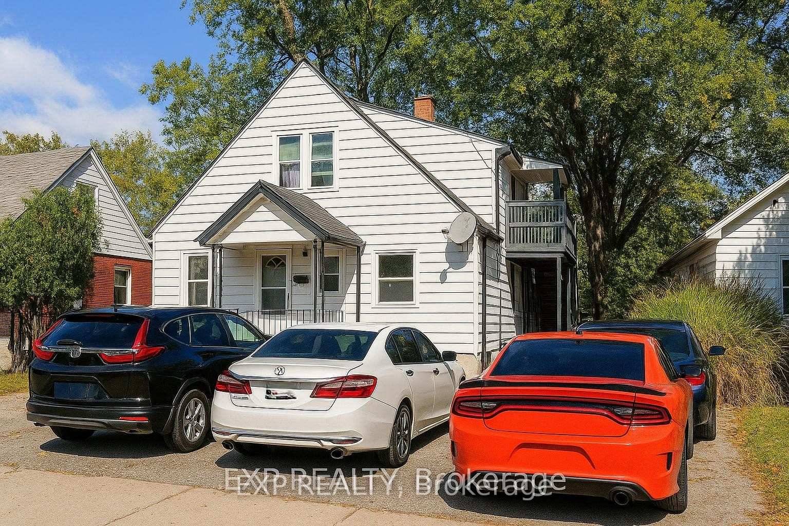 This legal triplex with rental license in place is larger than it appears with big addition in the back and walk out basement entrances, which features a bonus fourth suite.