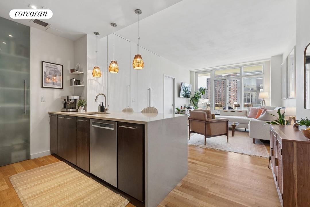 Turnkey, Tranquil Sun flooded Space with Private Terrace Residence 7D at The Conrad Condominium is meticulously kept and bathed in natural light through its desirable south facing city views.
