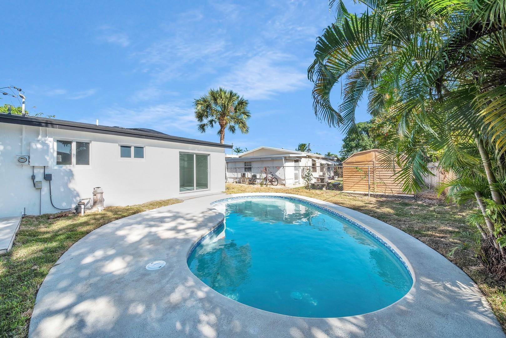This fully updated home features an open floor plan with neutral flooring, high hat lighting, and newly painted walls that create a bright and welcoming atmosphere.
