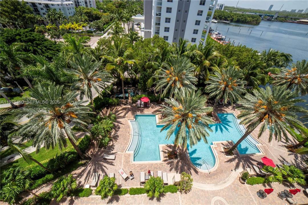 Beautifully upgraded 2 bedroom, 2 bath lower penthouse in the heart of Sunny Isles Beach, featuring southern exposure, tile flooring, in unit laundry, and an open concept kitchen.