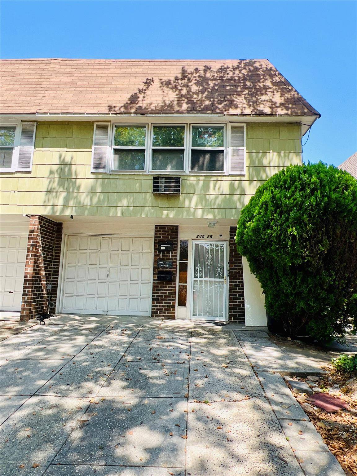 Welcome to this well maintained semi detached 2 family home located in the desirable neighborhood of Little Neck.