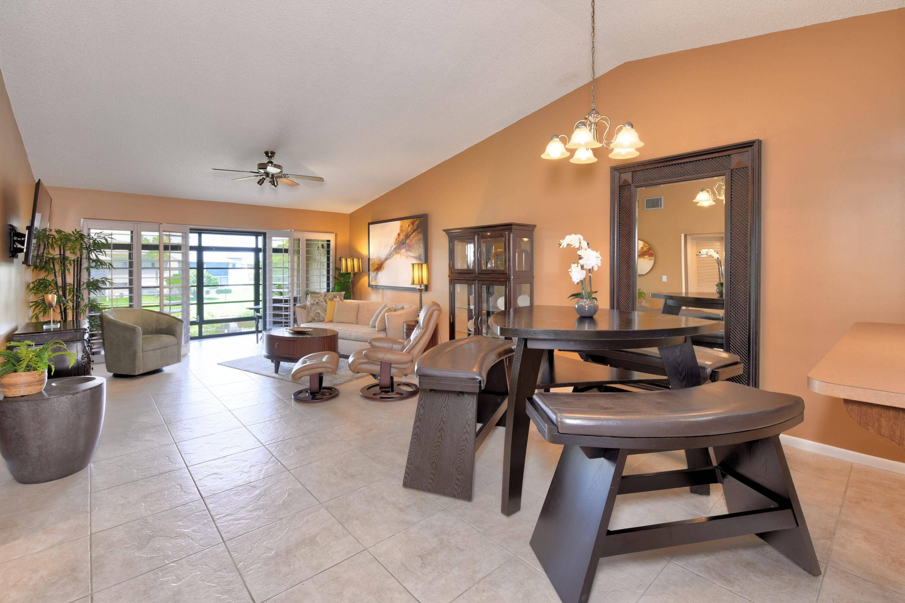 Rarely Available Oversized 1BR End Unit with Vaulted Ceilings Lake Views Indian PinesDiscover the perfect blend of space, style, and serenity in this beautifully maintained second floor 1 bedroom, 1 ...