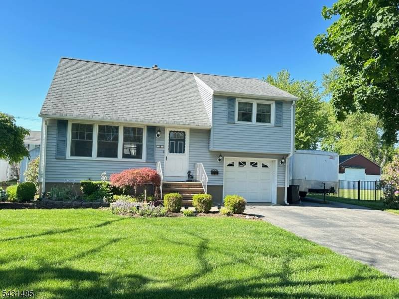 Welcome to this 3 Bedroom Split Level home in desirable Pequannock Township.