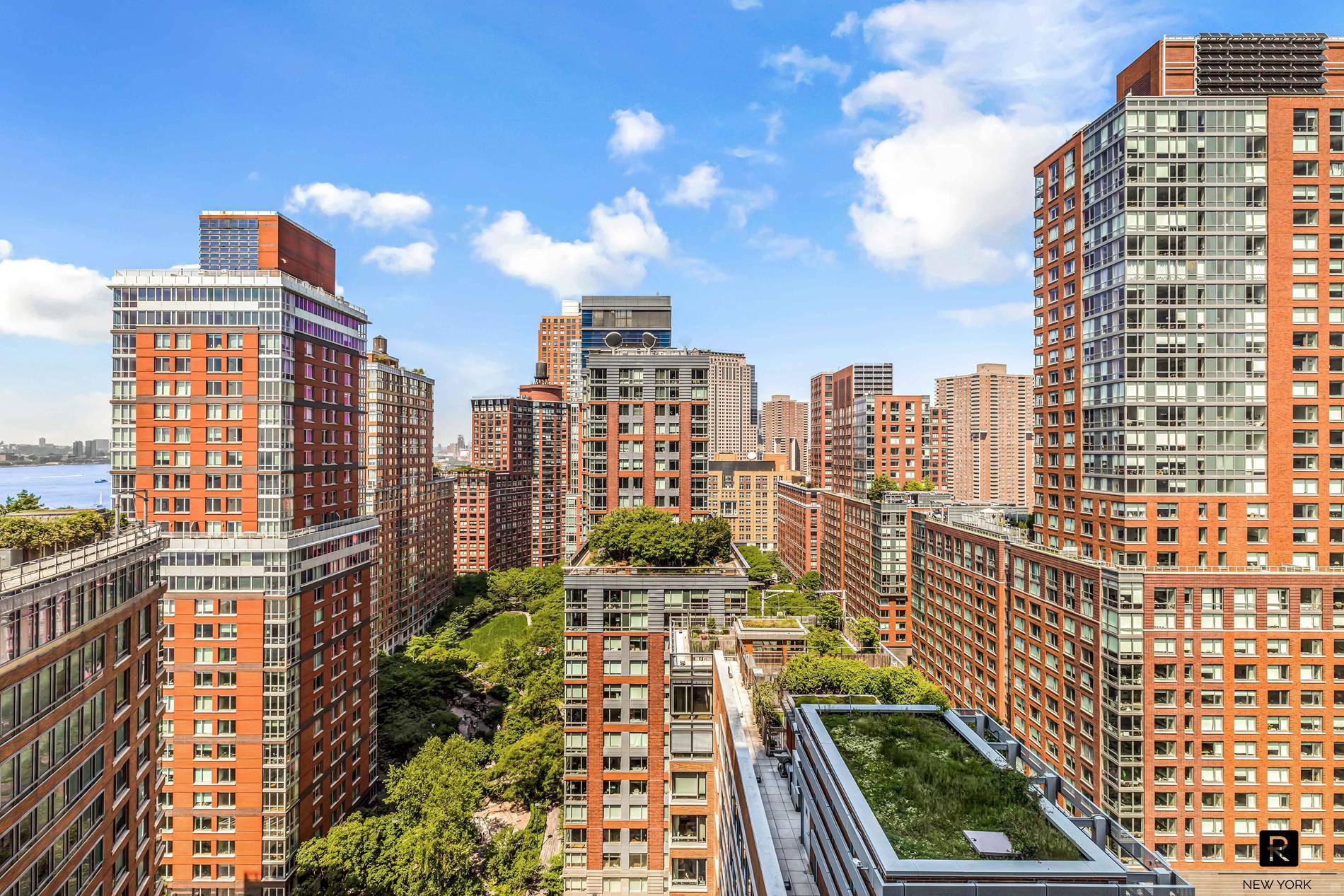 High floor three bedroom three bath in the Riverhouse, the only water front LEED Gold green condominium in North Battery Park West Tribeca.
