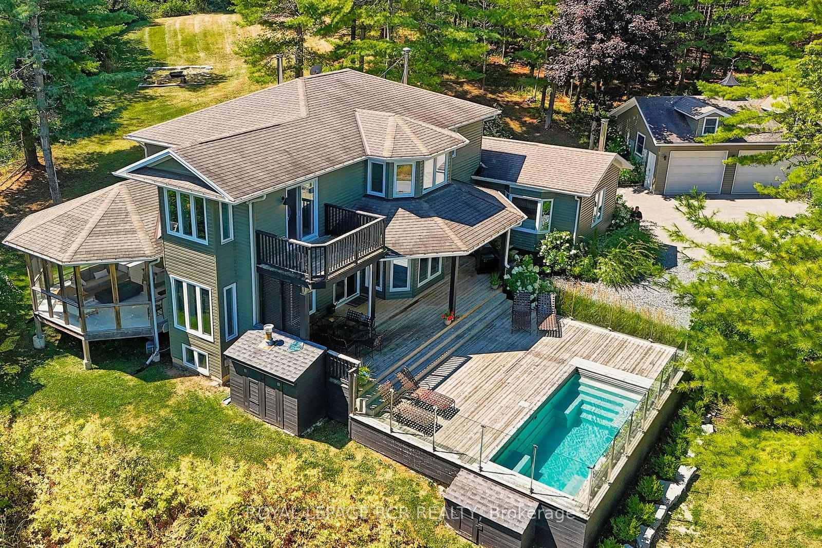 Designed with entertaining in mind, this property showcases a custom deck with a luxury salt water infinity pool.
