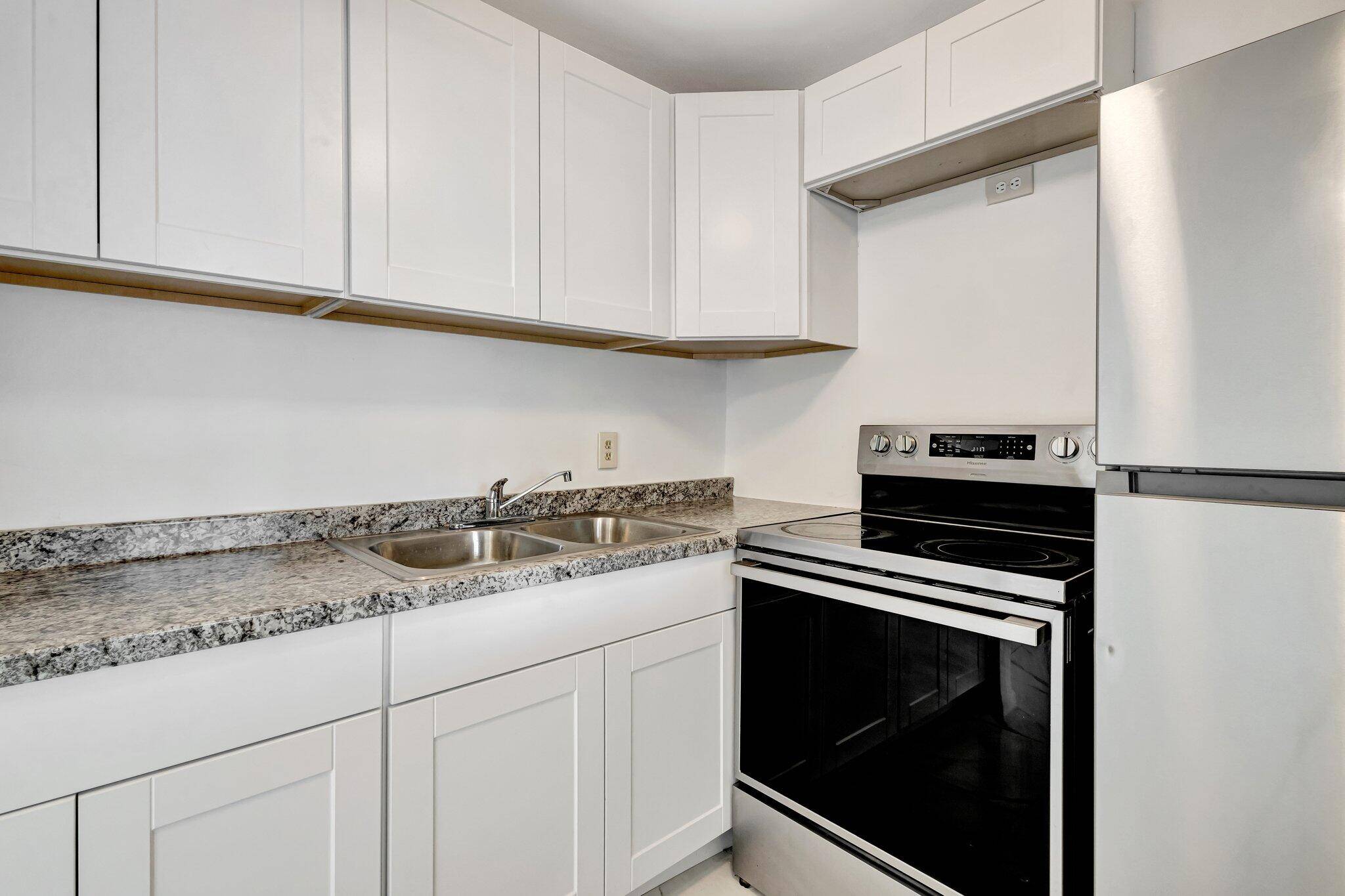 Move right into this beautifully remodeled first floor 1 bedroom, 1 bath condo in the desirable Century Village 55 community of West Palm Beach.