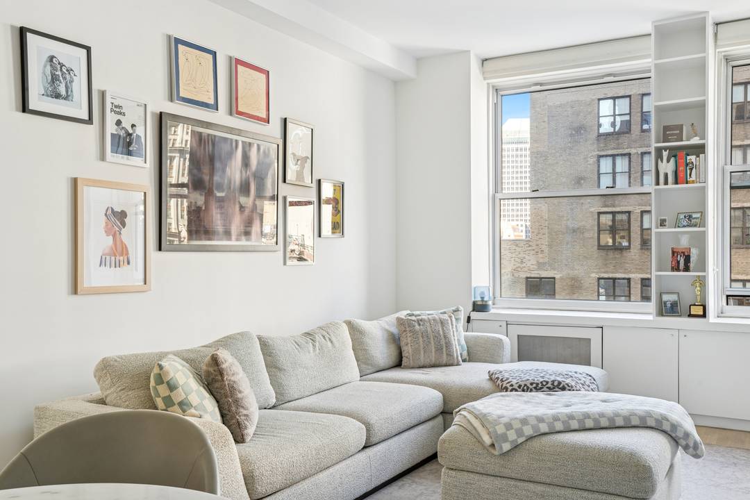Perched on the 22nd floor of Liberty Tower, this bright and quiet one bedroom home offers a rare blend of historic detail and modern refinement.