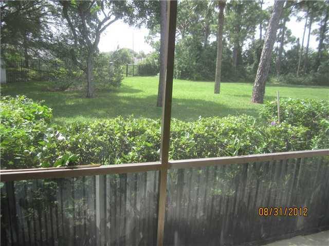 Exceptional opportunity to move into this first floor condo in the gated community of Palm Club West with swimming pool, tennis court, picnic area and much more.
