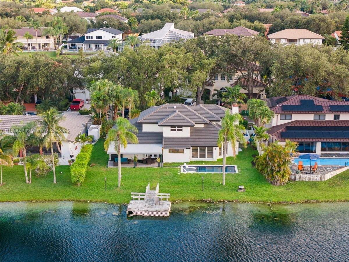 Stunning 4 bedroom, 3 bathroom lakefront home that perfectly blends comfort, style, and smart living.