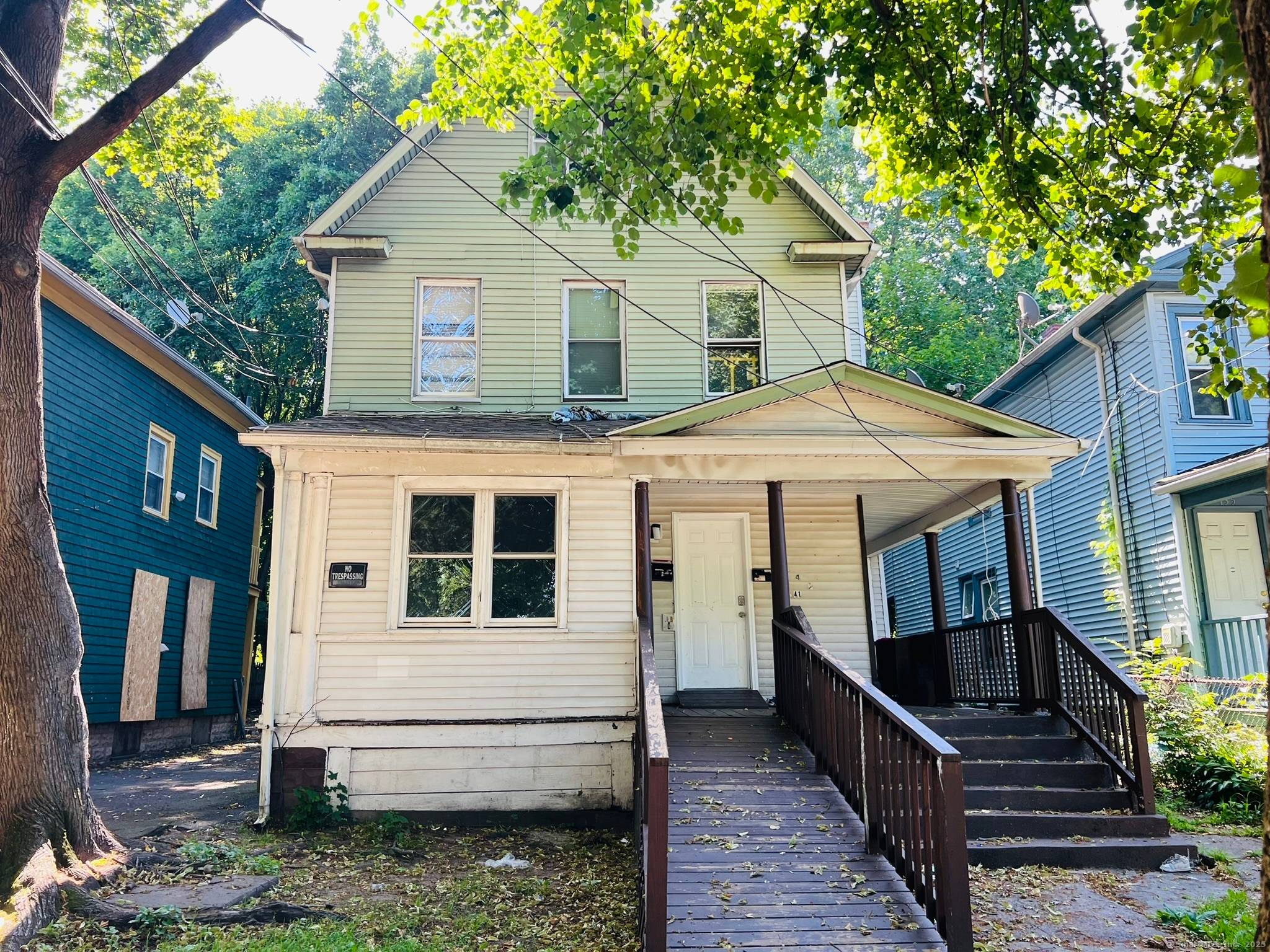 Investors, capitalize on this exceptional opportunity to acquire a fully tenanted three unit property, strategically located for commuters.