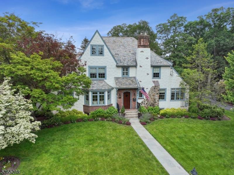 Stunning 5 Bedroom 5. 1 Bath, designer renovated home in Summit's prestigious Prospect Hill neighborhood.