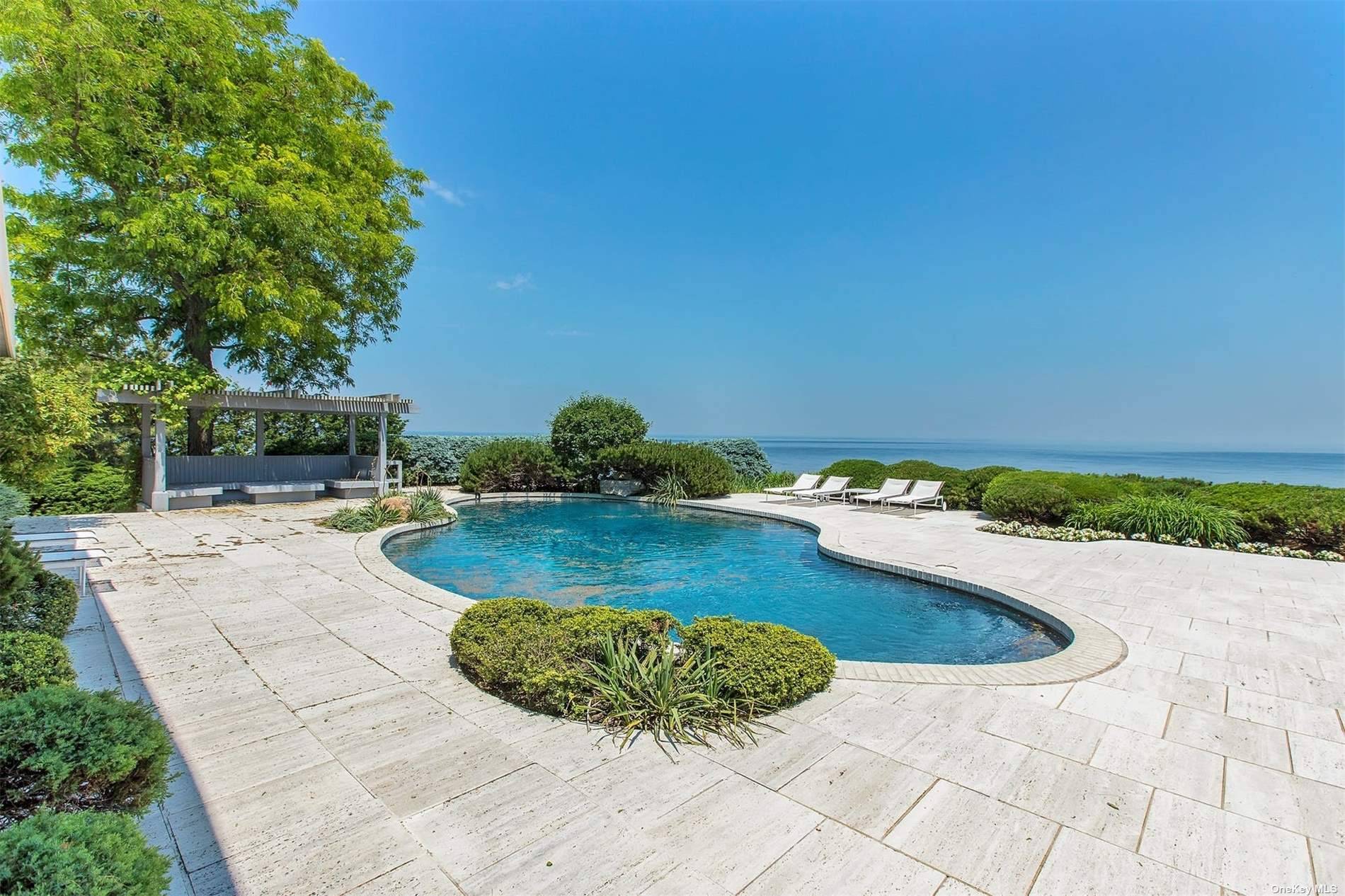 Sensational Mid Century Modern home makes a stunning architectural statement and is sited on 2.