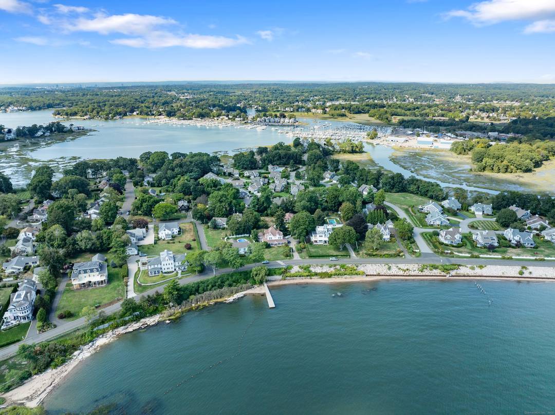 Nestled in the picturesque Linden Shore District, 40 Fair Winds is a luxurious home showcasing exceptional quality and timeless elegance within the Linden Shores community.