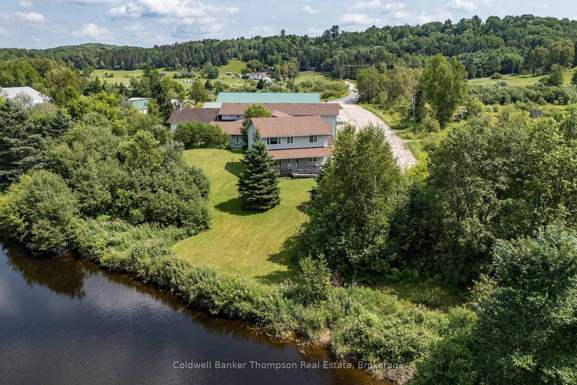 In town Waterfront, 2 storey dwelling with 2 separate units each has own utility costs.