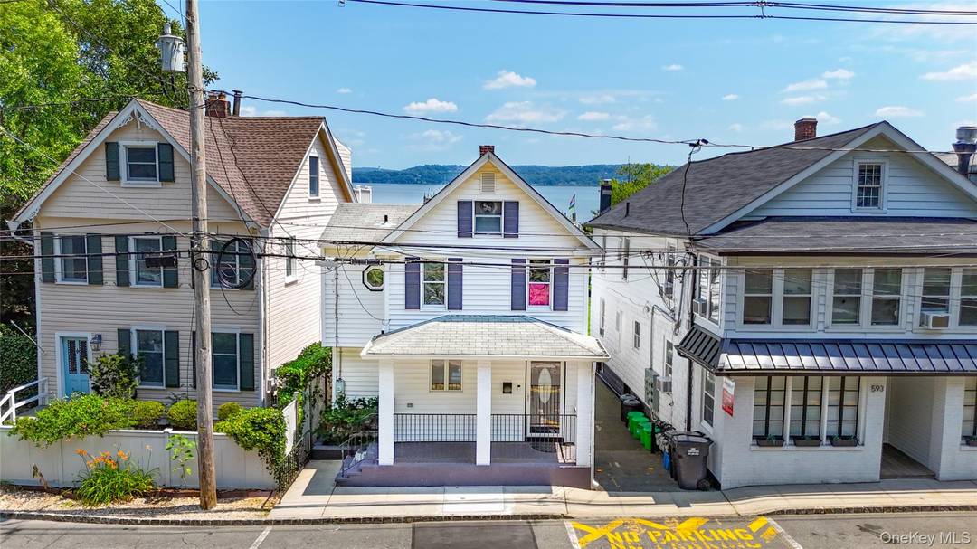 RIVERFRONT RETREAT Nestled in the heart of the highly sought after village of Piermont, this picturesque home offers an idyllic lifestyle with captivating views of the majestic Hudson River.