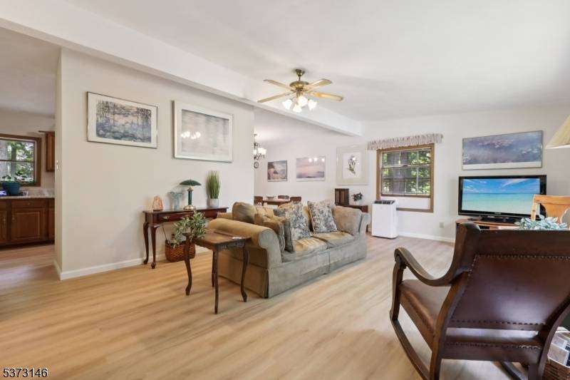 Welcome to this custom home located in desirable Randolph, offering 3 spacious bedrooms and 3 full bathrooms across two thoughtfully designed levels.