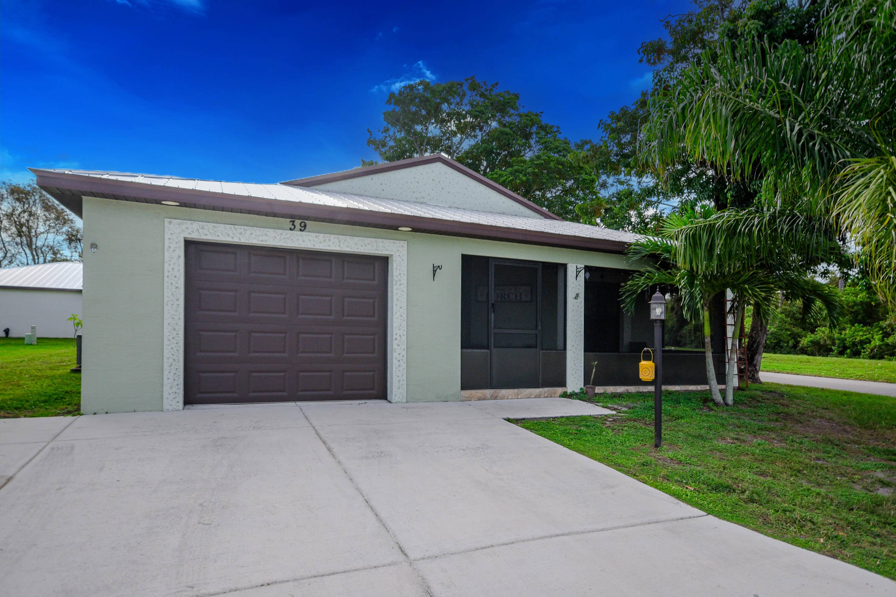 Charming 2 bedroom, 2 bath CBS home built in 2020, located in the highly sought after 55 community of Spanish Lakes.