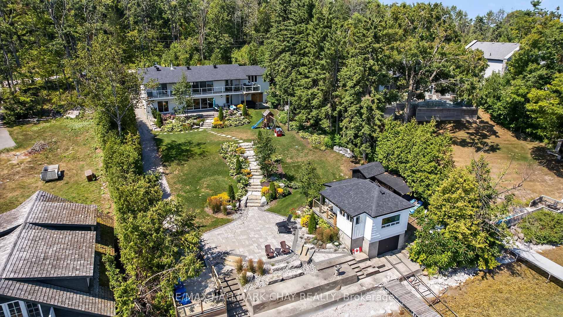 On a quiet, tree lined crescent, this turnkey brick bungalow offers an exceptional lifestyle on one of Lake Simcoes most sought after stretches of shoreline.
