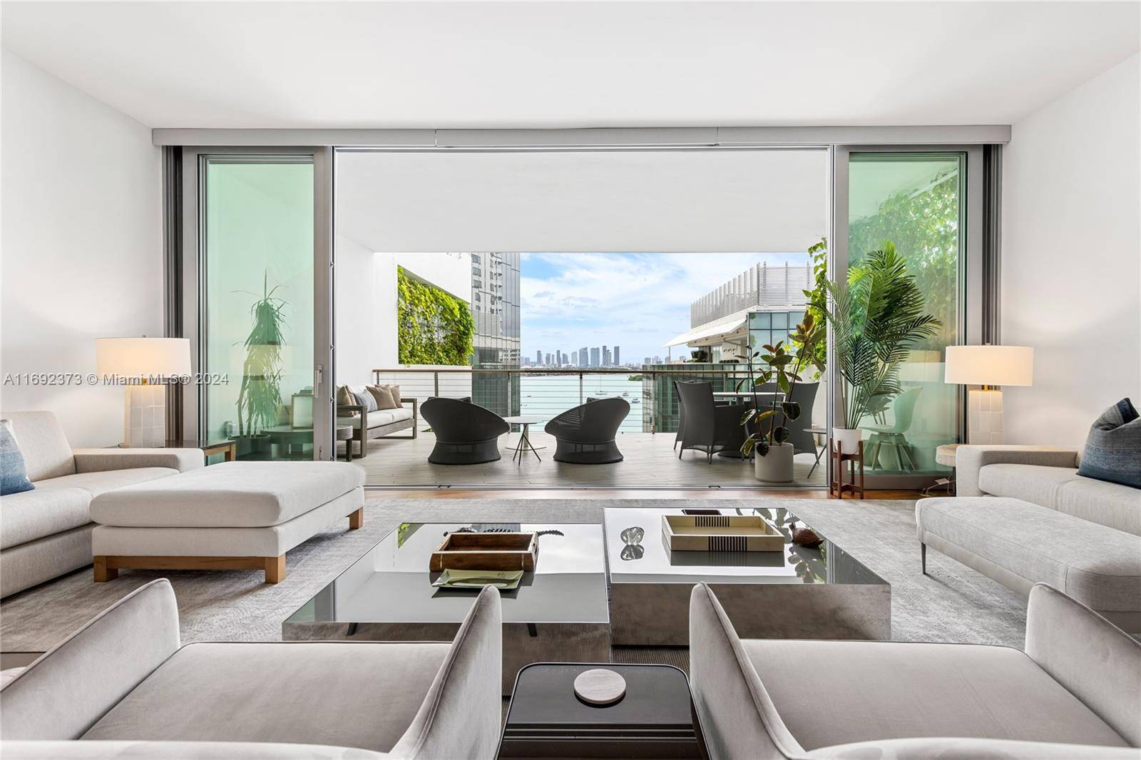 Experience the elegance of Monad Terrace, Unit 8D a stunning waterfront residence designed by Pritzker Prize winning architect Jean Nouvel, part of an exclusive collection of 59 homes along Biscayne ...