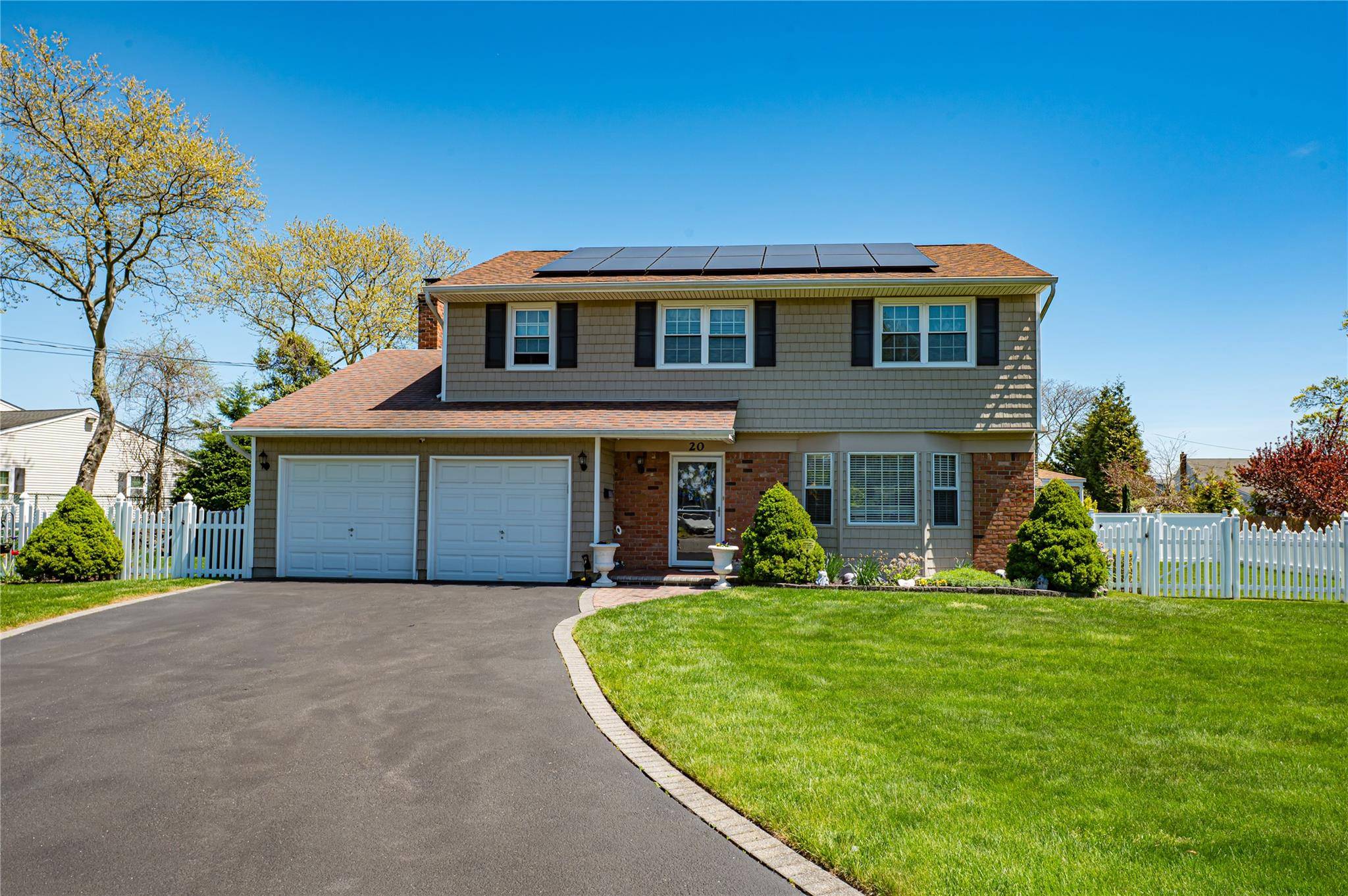 Elegant 4 bedroom 2. 5 bath side hall Colonial situated on a 108x100 generous lot.