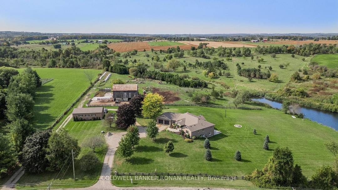 This 125 acre property features a peaceful landscape of rolling meadows, mixed bush, and a large stream fed pond.