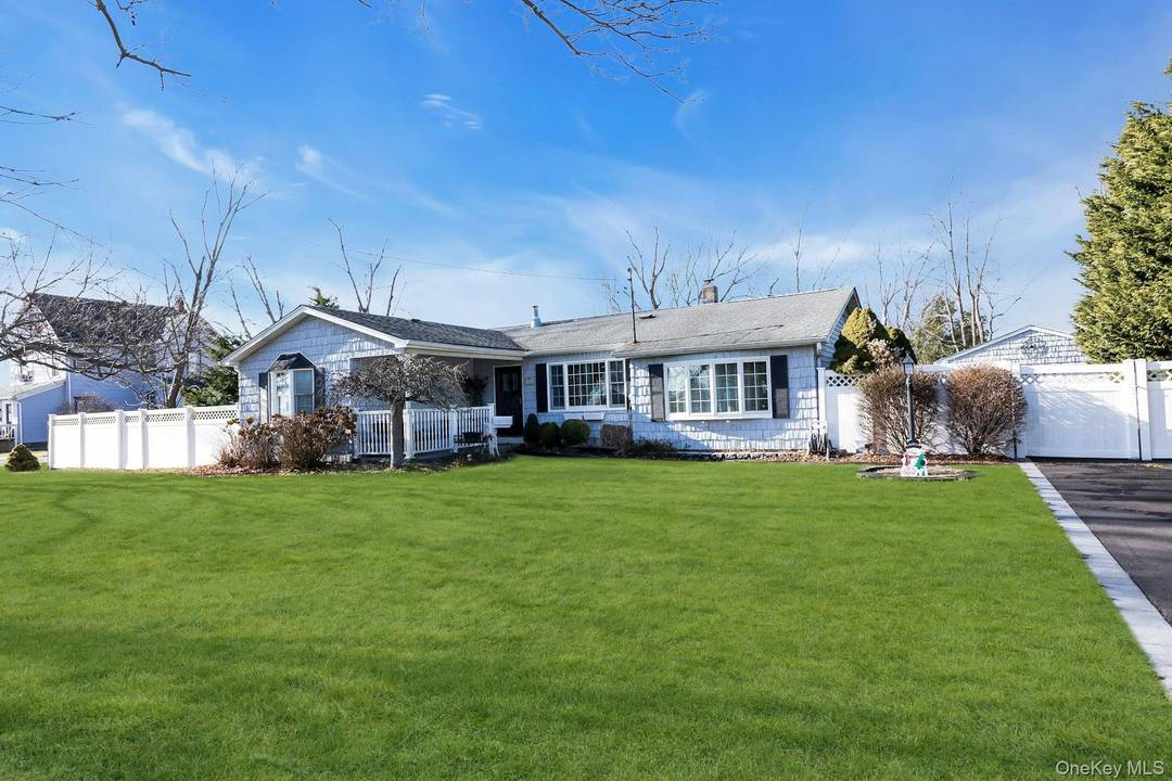 Welcome to 358 Rider Ave, Patchogue a beautiful, sprawling ranch that perfectly blends comfort, space, and coastal charm.