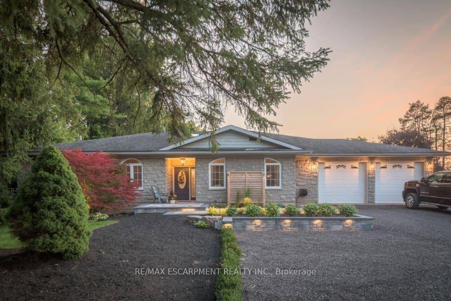 Are you looking for a custom built 3, 161 square foot bungalow on that sits on 2 acres ?