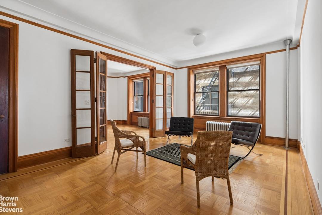 Classic prewar roomy 3 bedroom apartment, with oak floors, French doors, separate regal dining room, numerous deep closets, and direct south and east exposures,.
