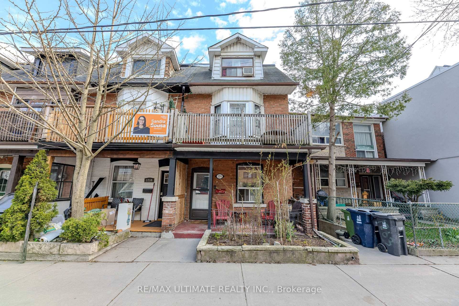 Live and Earn Income in This Beautiful Corner Row Townhouse !