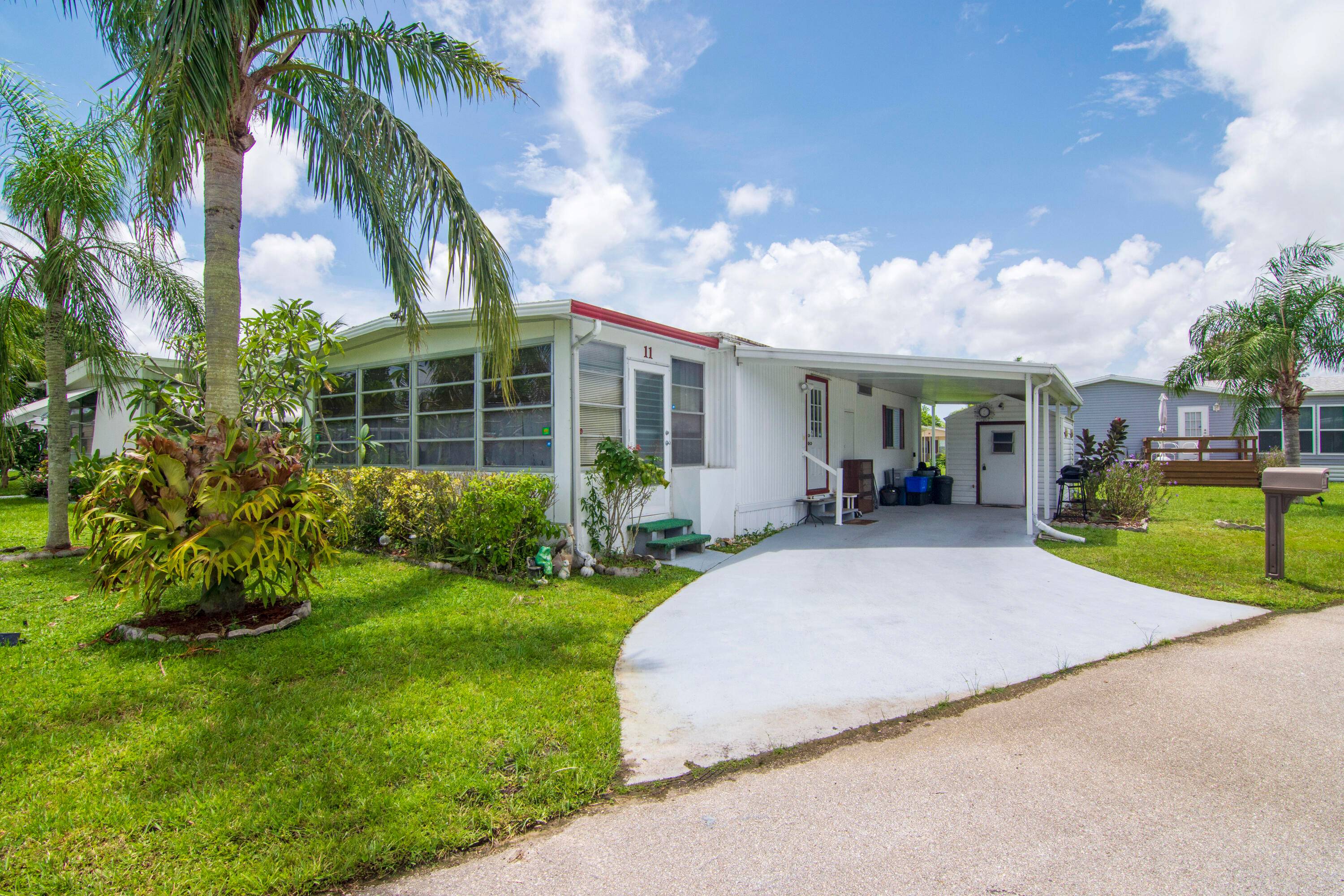 Charming, 2 2 home located in the desirable 55 Community of Spanish Lakes Riverfront.