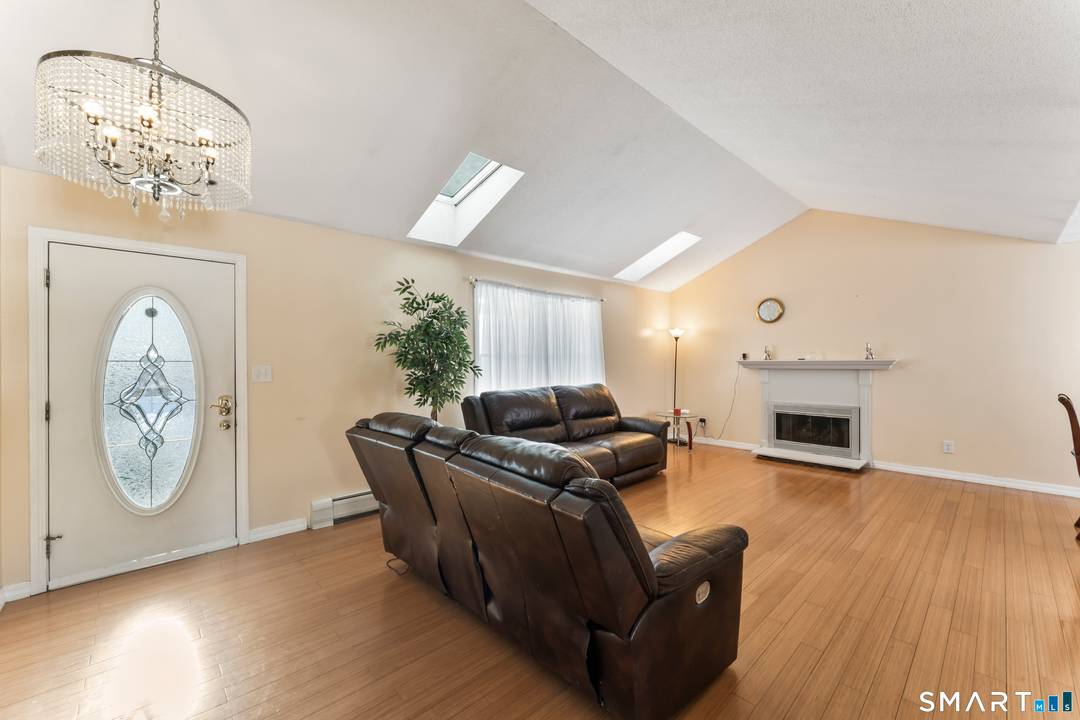 Welcome to 71 Sentinel Drive, a beautifully maintained and thoughtfully designed home offering space, light, and versatility in Hilltop, a desirable Derby neighborhood.