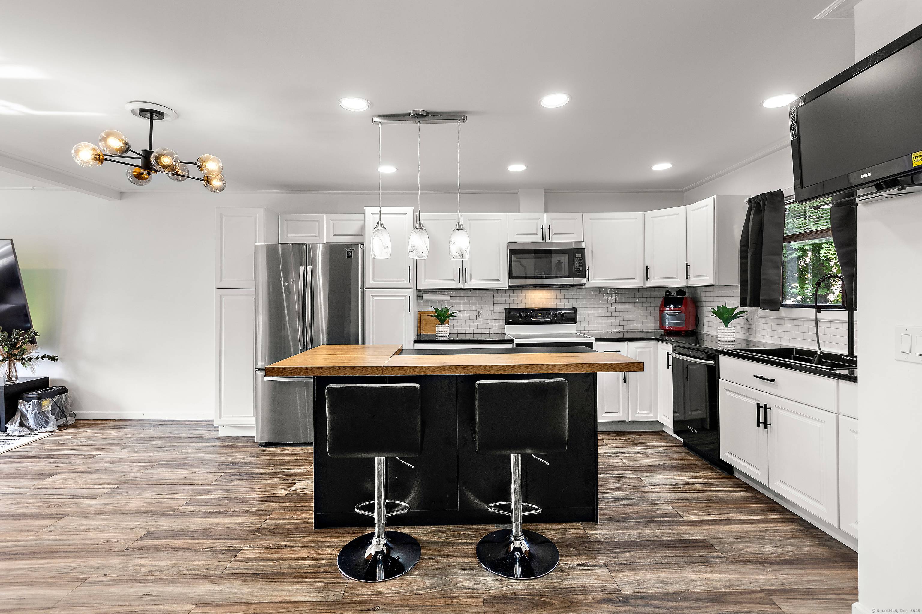 Stunning tri level townhome fully updated move in ready !
