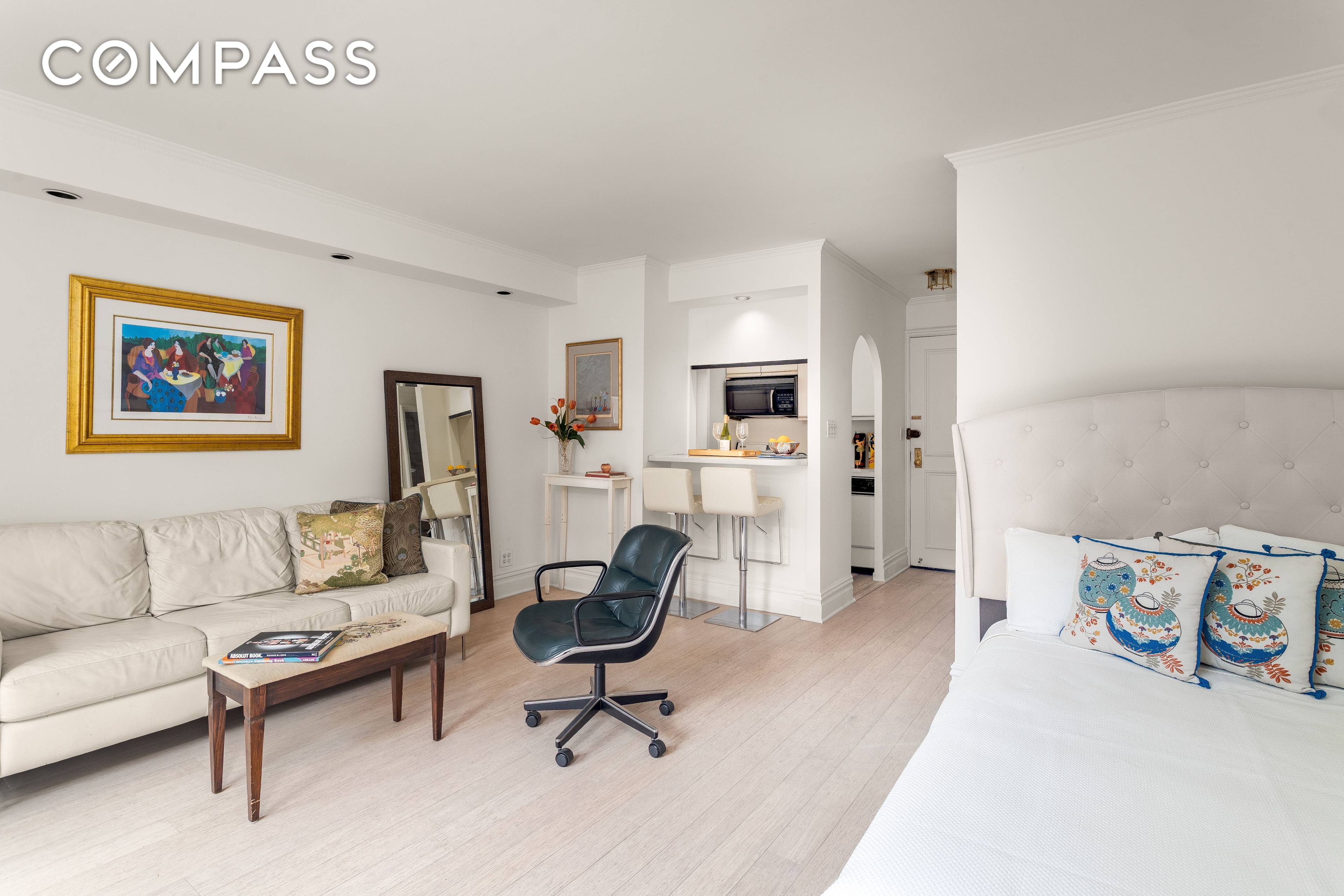 EXCEPTIONAL VALUE ! BRIGHT SOUTH FACING STUDIO with ICONIC VIEWS in FULL SERVICE MIDTOWN EAST CO OP.